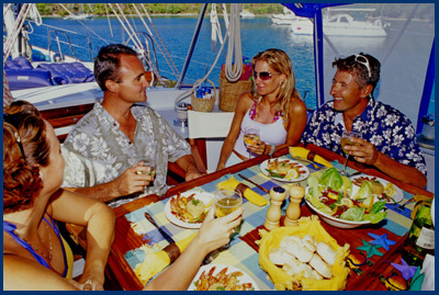 Guests enjoying lunch al fresco on the yacht in the Virgin Islands